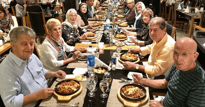 Tourists in Haft Khan Restaurant Complex